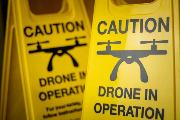 Folding Yellow Drone Safety Sign